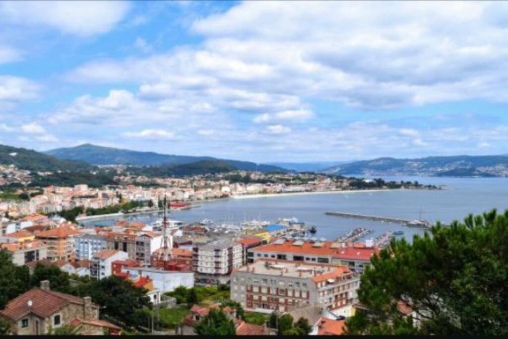 Atico En La Playa De Cangas Bagian luar foto